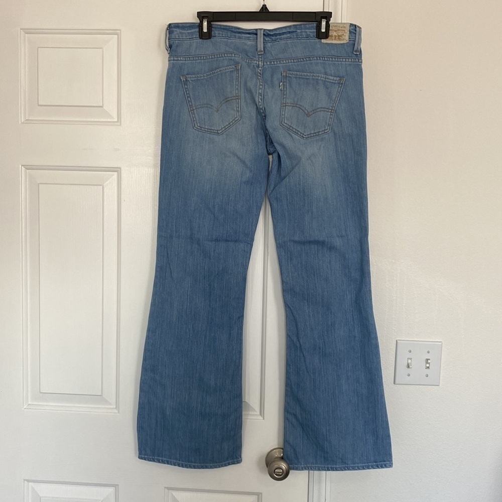 Levi light wash low flare denim. - Picture 6 of 13